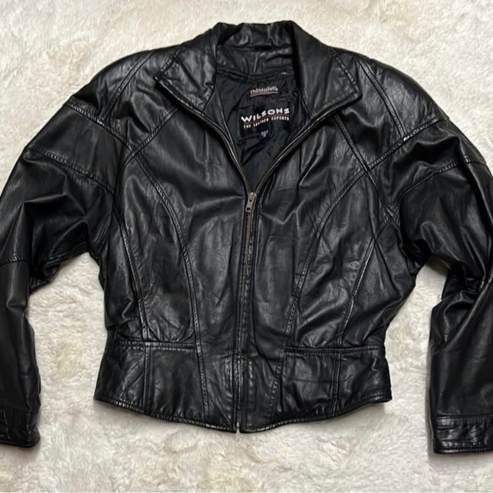 Wilsons leather women’s size medium black motorcycle jacket.